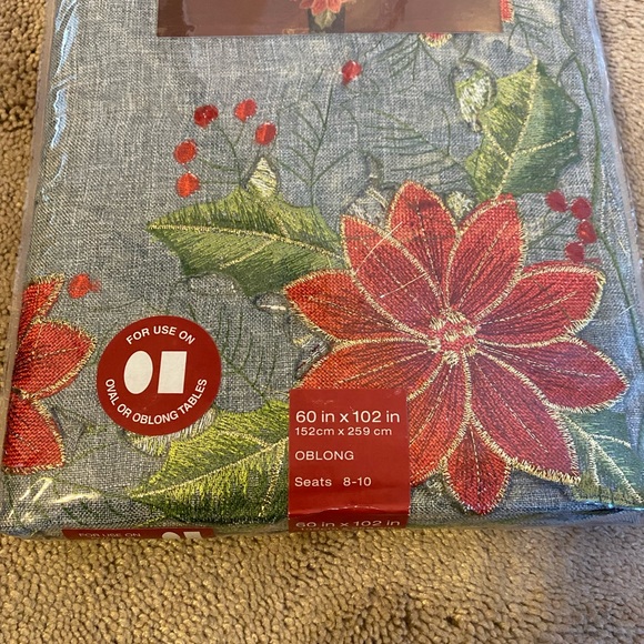 Holiday tablecloth, poinsettia, 60x102, oblong, new in package. - Picture 3 of 4